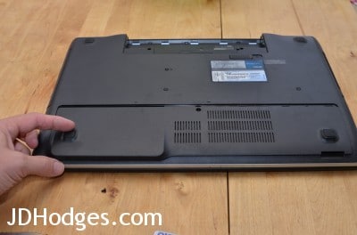 Gently pull toward you to remove the access panel (I recommend using one hand on each of the laptop 'feet' to pull against)