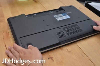 Position the access panel and gently push it all the way back into place