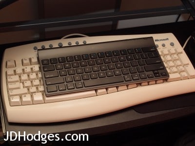 Logitech on top of vintage full size Microsoft keyboard