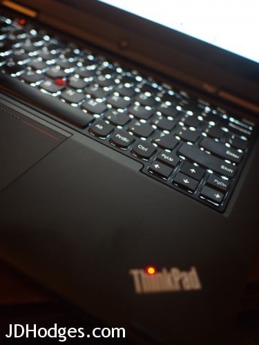 Red LED accent for 'i' in the ThinkPad logo