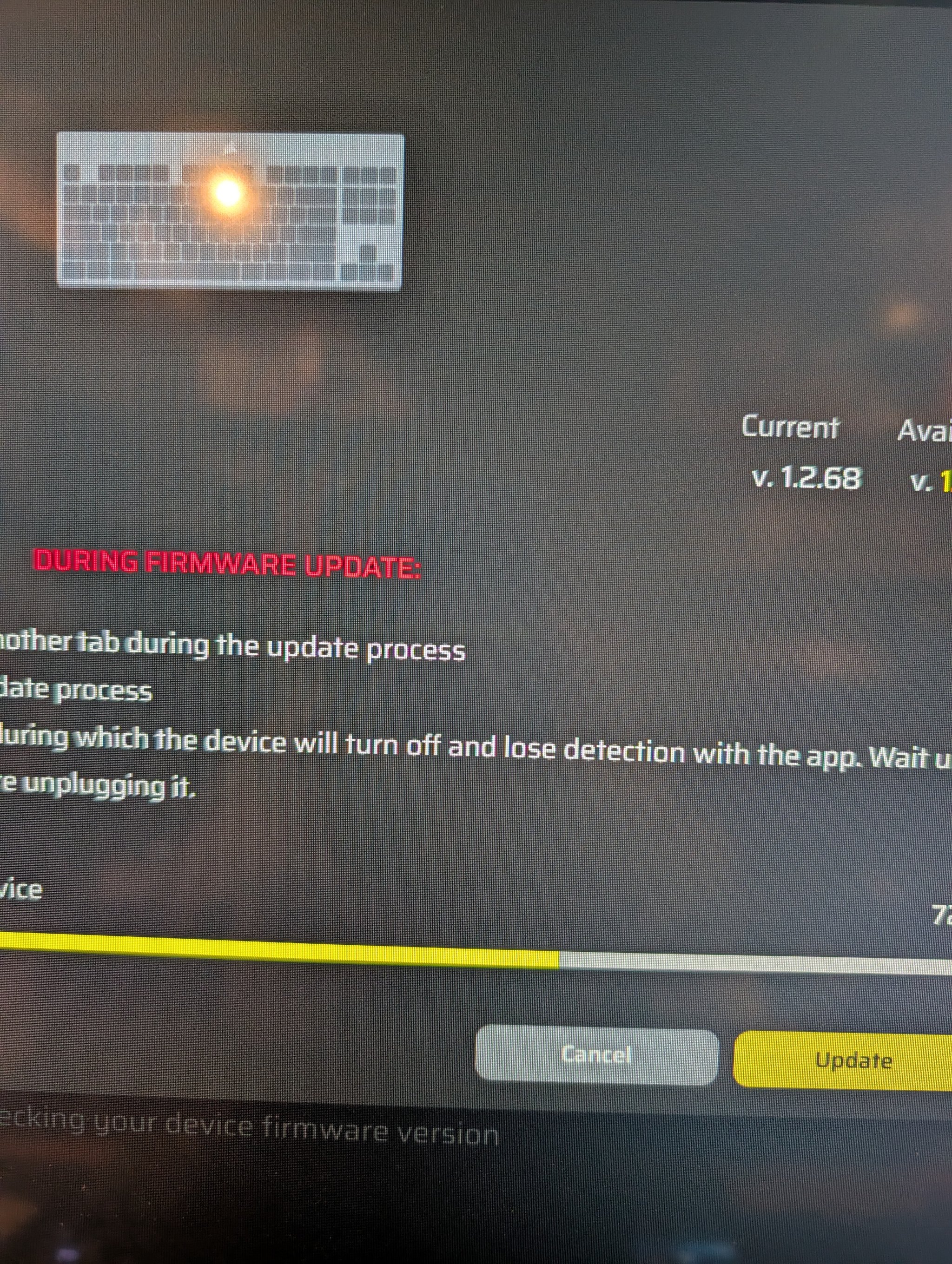 Firmware update in progress on screen