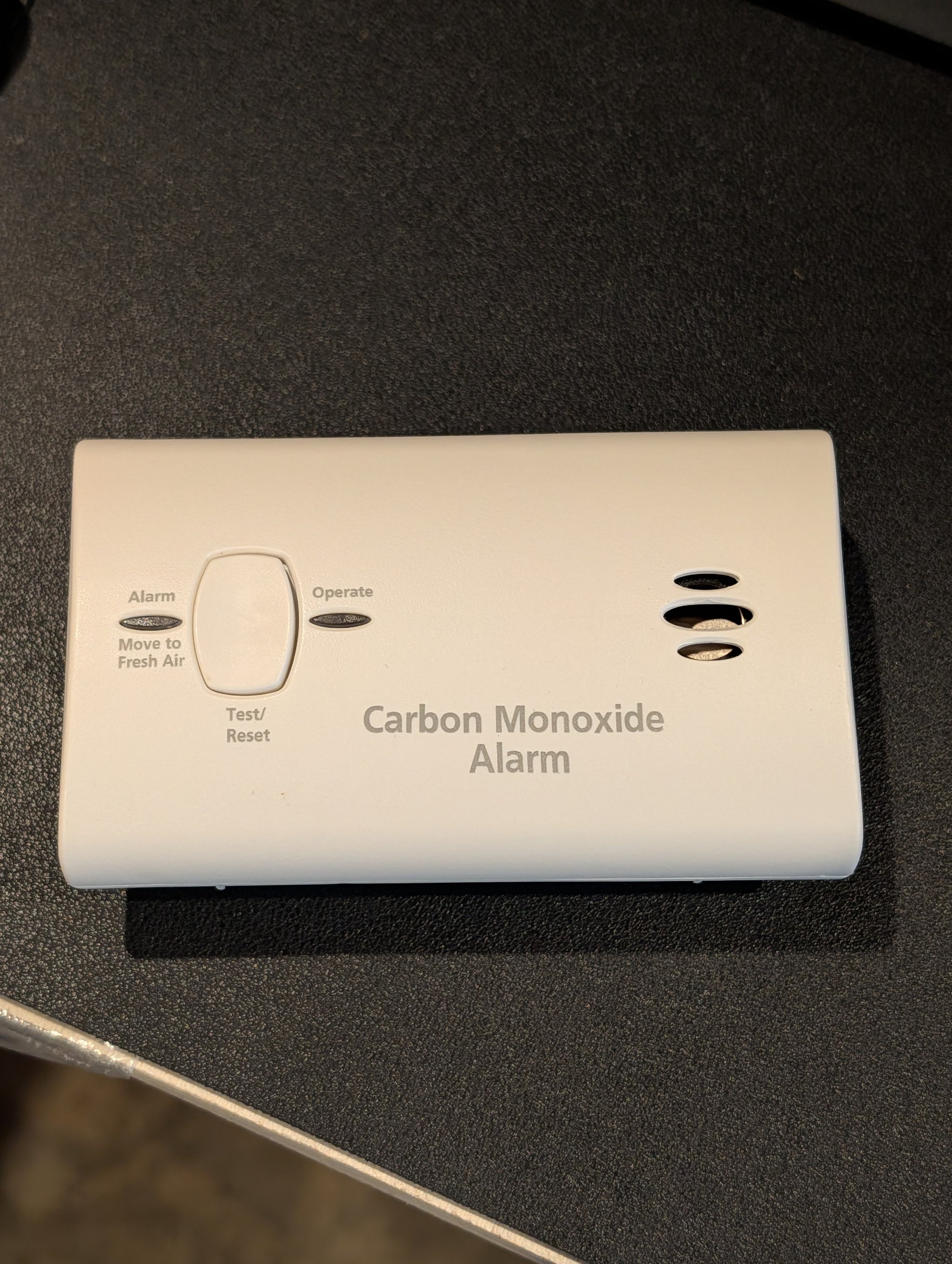 Kidde KN-COB-LP2 carbon monoxide alarm front view showing Test/Reset button, Alarm and Operate LEDs