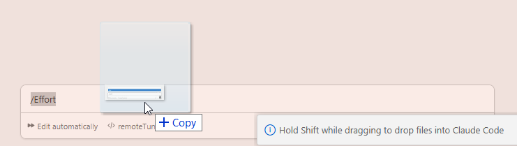 Claude Code VS Code extension showing Hold Shift while dragging to drop files into Claude Code tooltip with a file being dragged