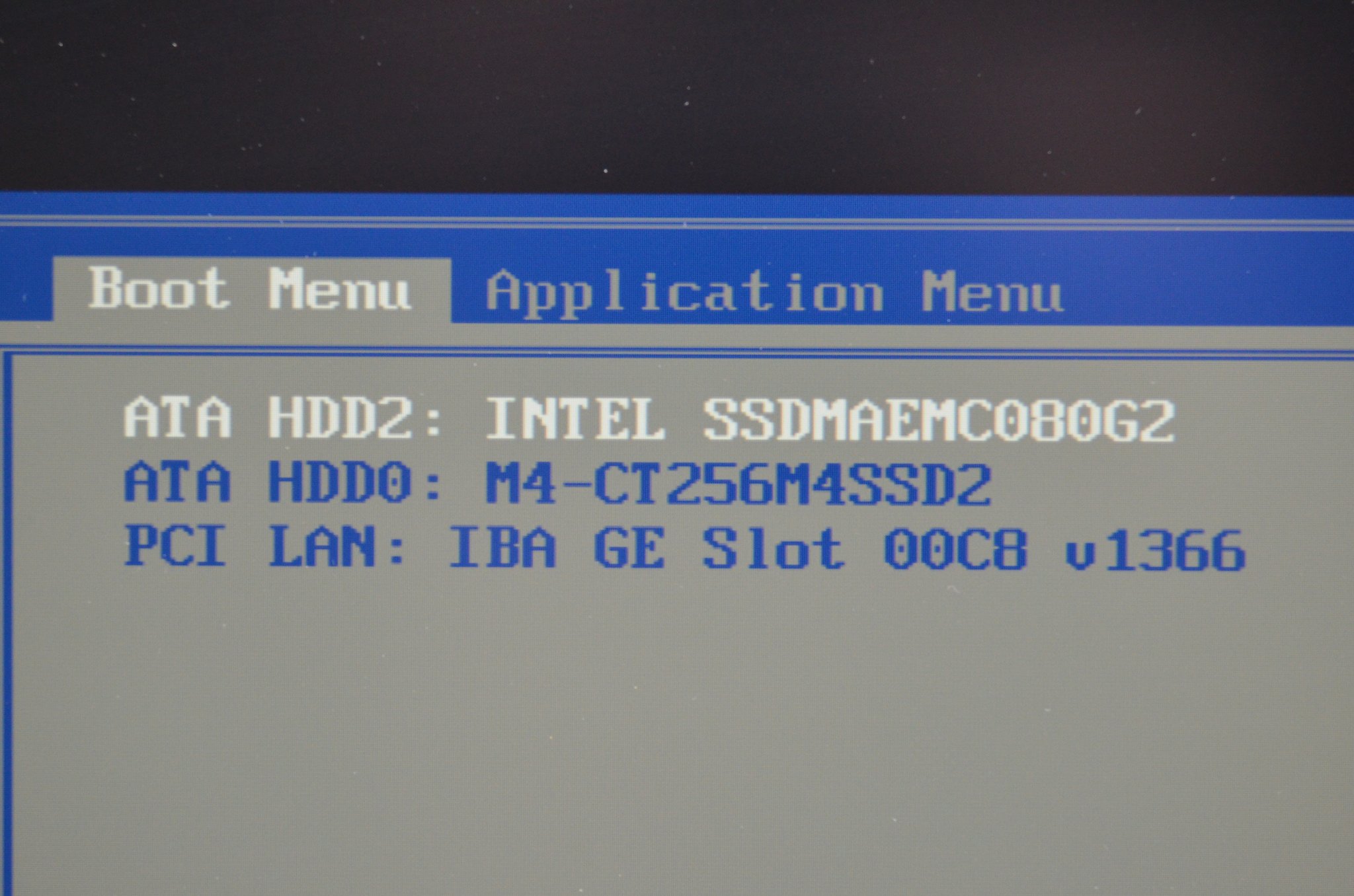 ThinkPad BIOS boot menu showing two simultaneous boot devices, an Intel 80 GB mSATA SSD (SSDMAEMC080G2) and a Crucial M4 256 GB 2.5-inch SSD (M4-CT256M4SSD2), plus PCI LAN, on an X220.